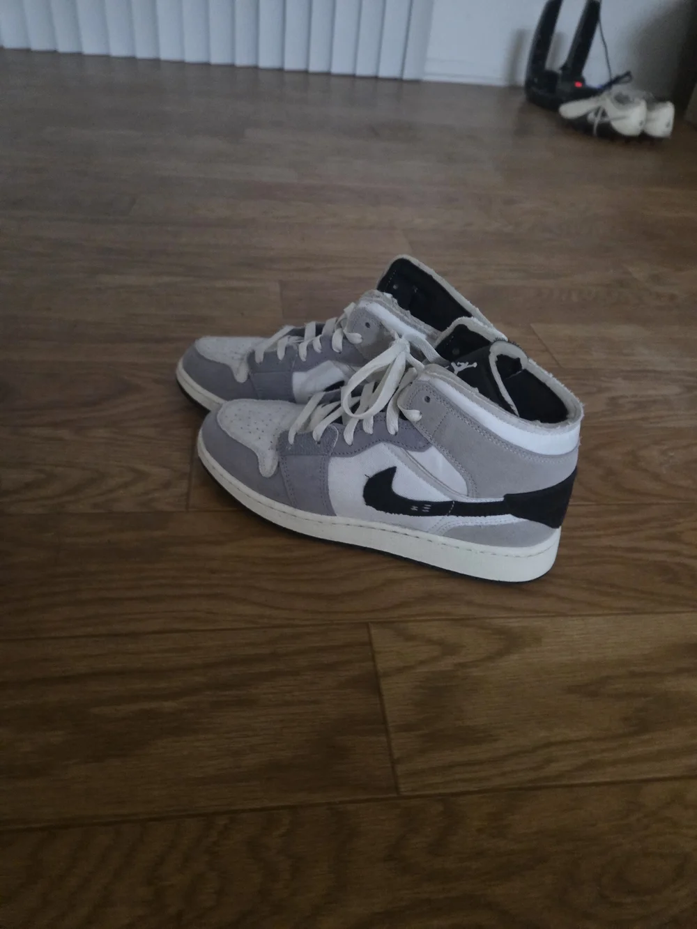 Kids High-Top Sneakers in Gray and White with Black Swoosh